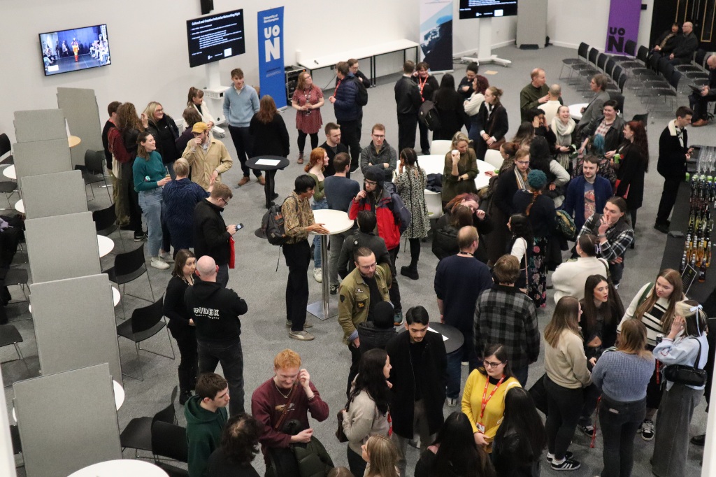 Looking down at a large group of people from above.