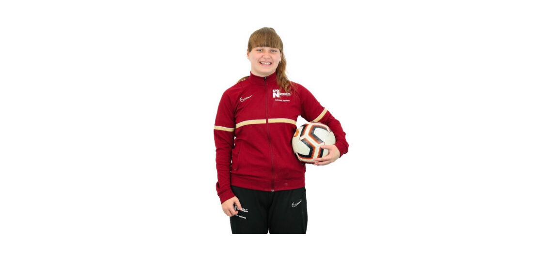 Banner photo shows Bethany Cox, a Northampton Energy Elite Scholarship Athlete, wearing a UON-branded kit. She is holding a football under one arm.