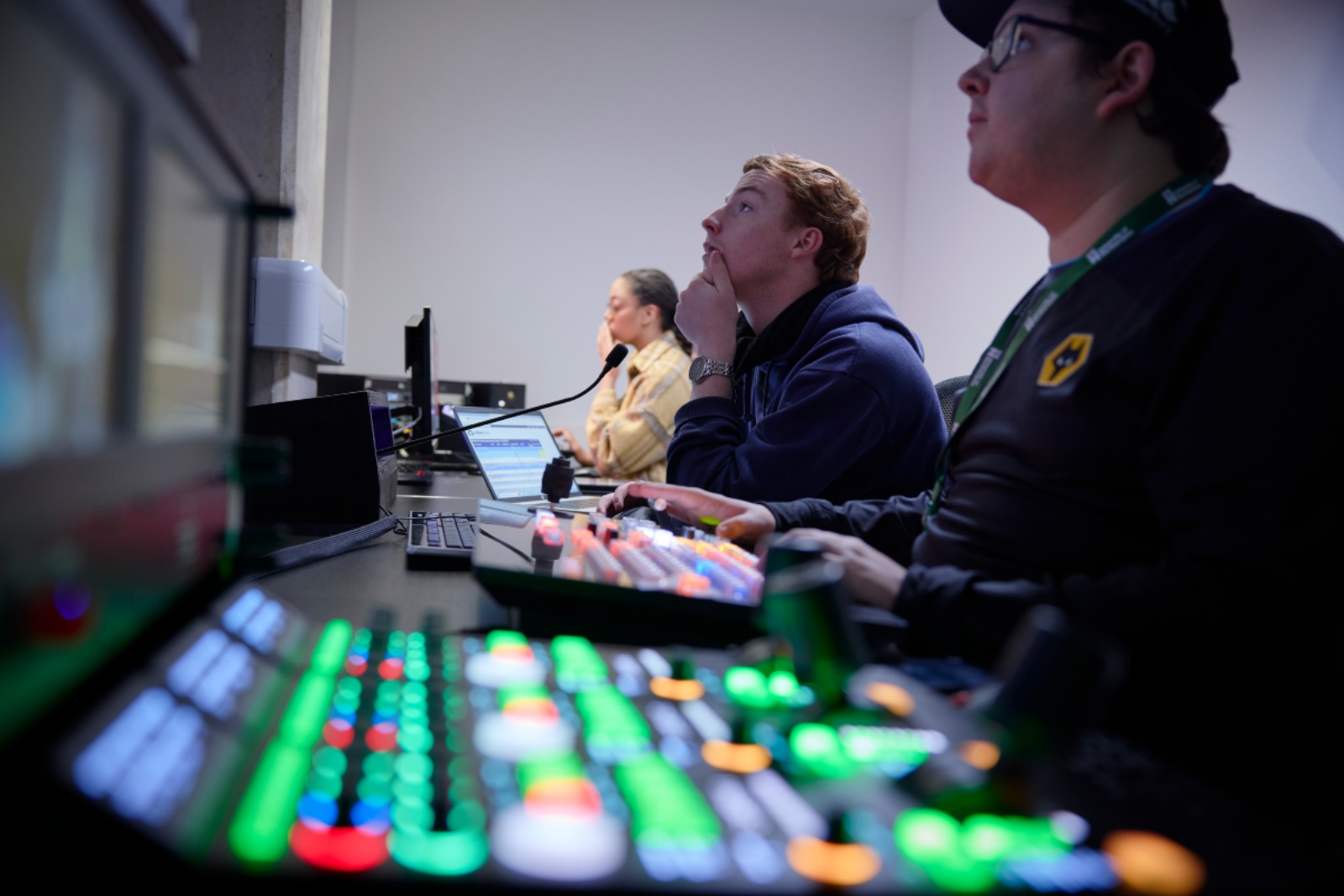 Media students control board.